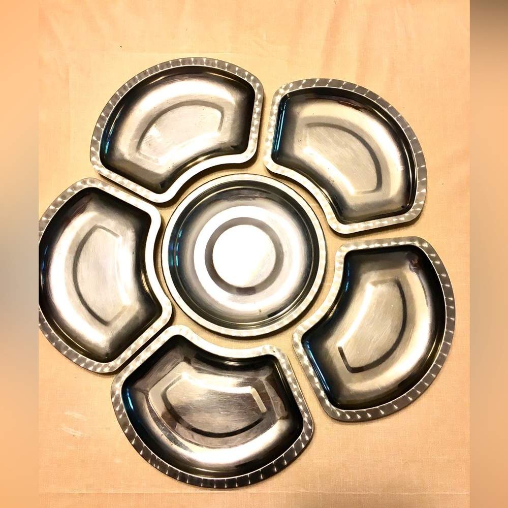Six stainless steel plates